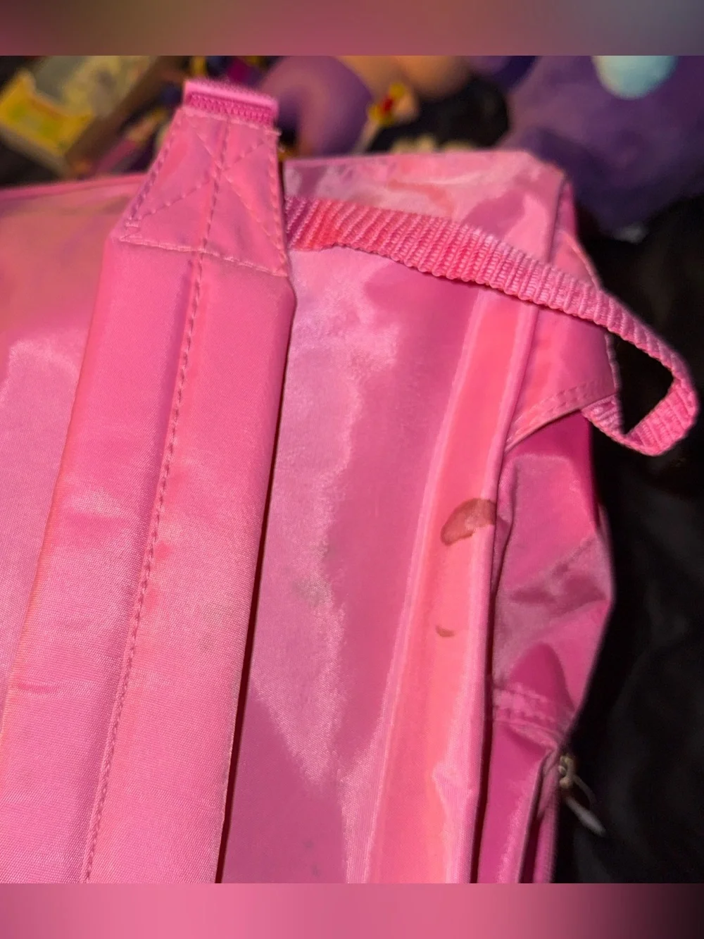 Care Bears pink backpack flaws
